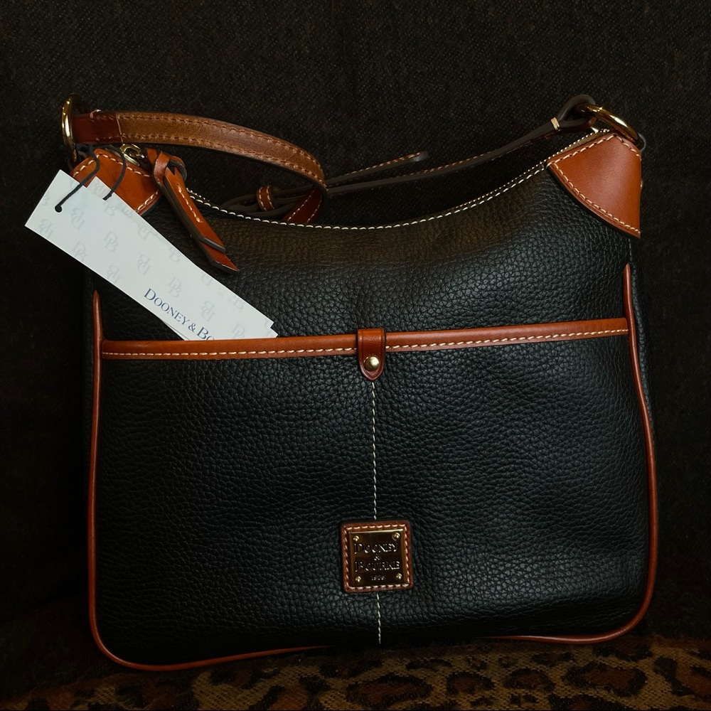 Dooney & Bourke crossbody black and brown leather bag. NWT